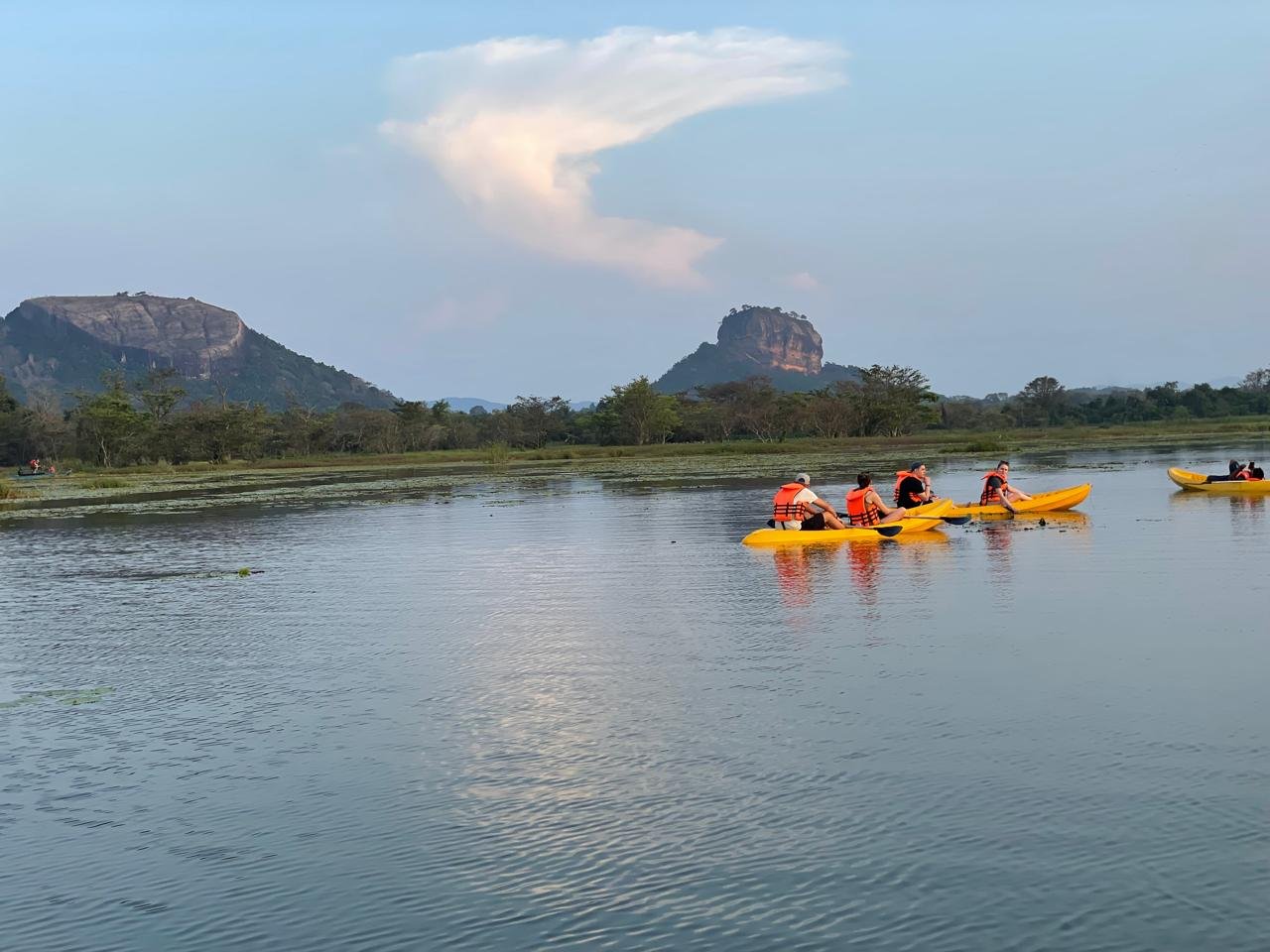 Kayaking with Sigiriya visible across the water