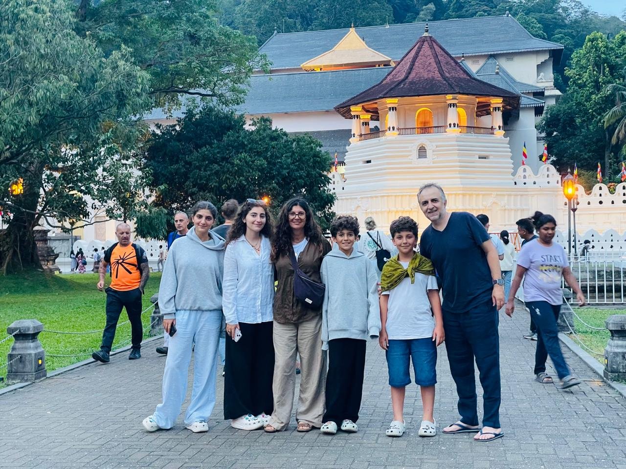 Family visiting a cultural site in Kandy